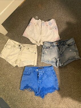High-Rise Distressed Denim Shorts - Blue